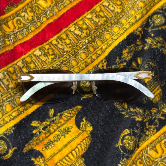 White Cartier buffs